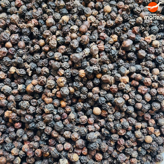 Close-up of black Tellicherry peppercorns 